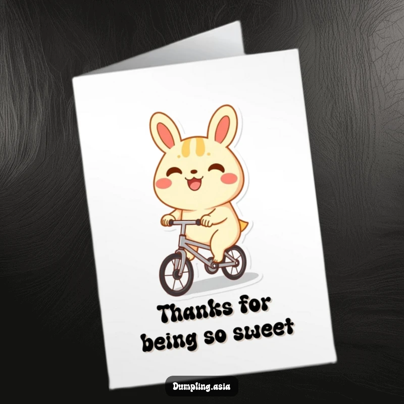 Funny Free Printable Thank You Card: A happy bao bun character cycles with a big grin, spreading thanks.
